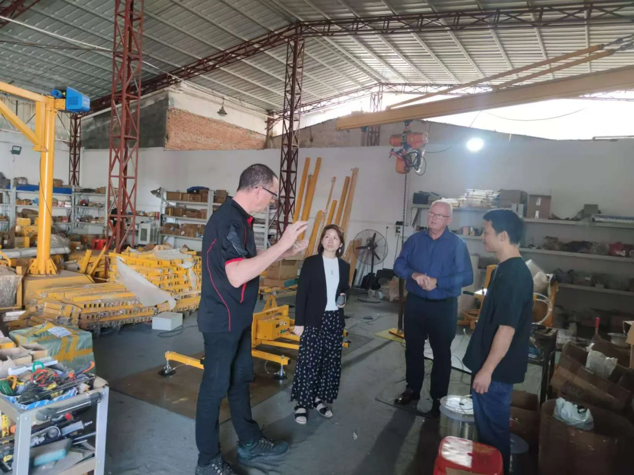 Discussing a handling operation around real equipment. Sample trials and acceptance requirements should be agreed before the order.