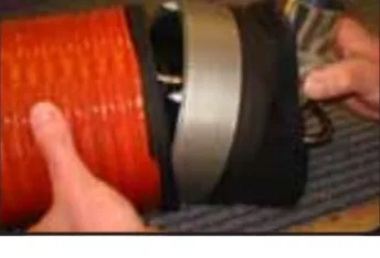 Upper joint with the cover moved aside: identify the adapter before ordering a replacement tube.